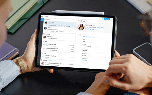 Equipo de trabajo probando el asisente Zia para conocer el precio de un CRM con IA.